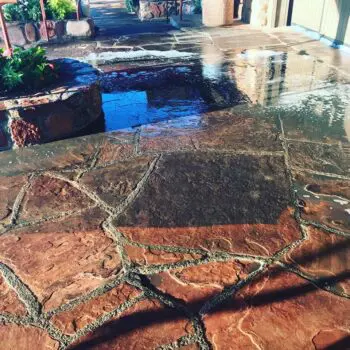 Wet stone patio after cleaning